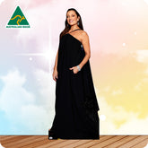 Woman wearing a black one-shoulder dress with a blurred background and 'Australian Made' logo.